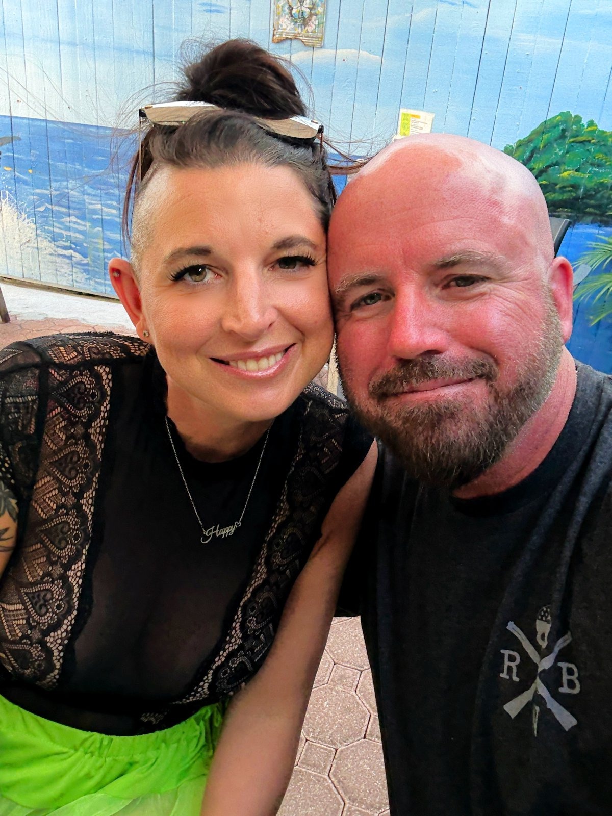 Happy Hotwife and her Cuckold husband smiling in a selfie