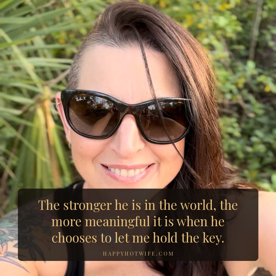 "The stronger he is in the world, the more meaningful it is when he chooses to let me hold the key." Quote from Becoming Happy Hotwife, Chapter 16. Happy Hotwife smiling in sunglasses in the Florida sun.