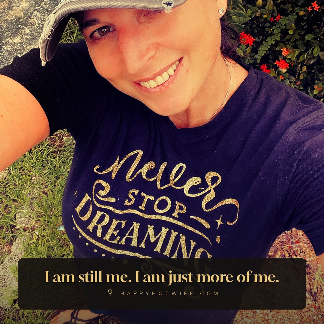 "I am still me. I am just more of me." Quote from Becoming Happy Hotwife. Happy Hotwife outdoors in a Never Stop Dreaming t-shirt.
