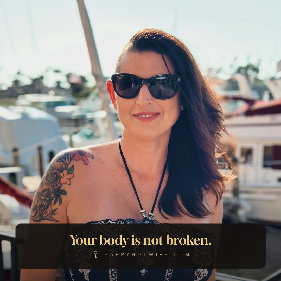 "Your body is not broken." Quote from Becoming Happy Hotwife. Happy Hotwife at a marina in an embroidered top.